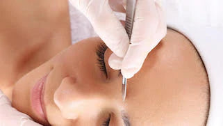 Dermaplaning treatment to remove surface buildup and refine skin texture